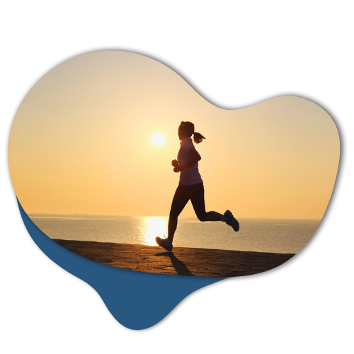 Silhouette of a woman jogging at sunrise by the water, symbolising health and wellness for allied health professionals.