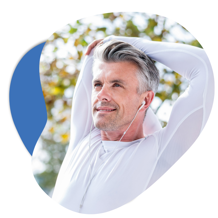 Man stretching outdoors in athletic wear, promoting health and wellness for physiotherapy patients.
