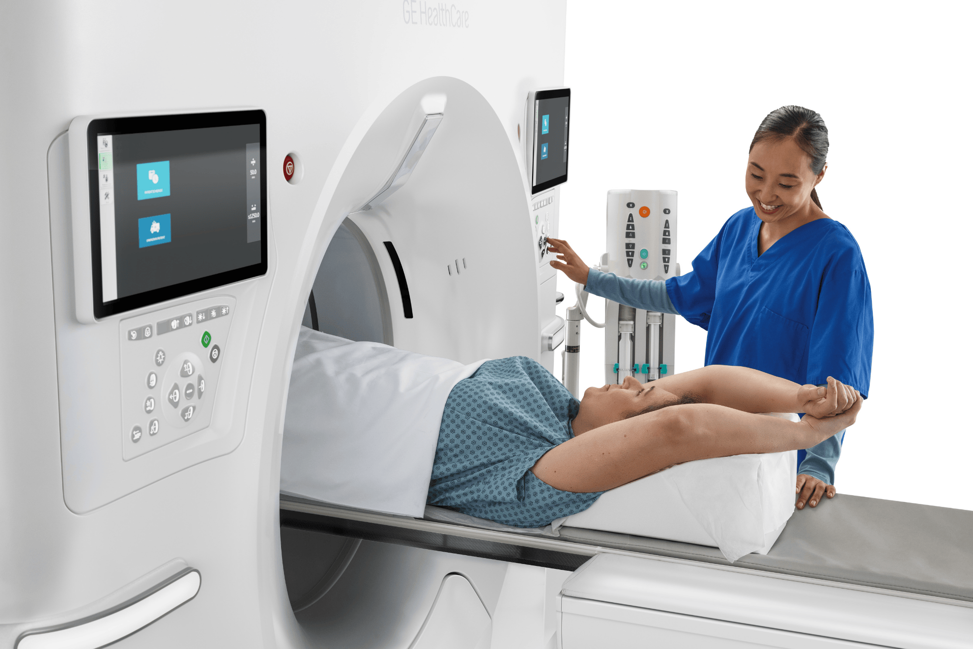 Patient undergoing CT scan in medical imaging centre, with technician assisting, highlighting advanced imaging technology and patient care at Life Medical Imaging.